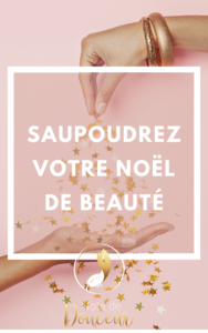 Main saupoudrant étoiles dorées Noël beauté